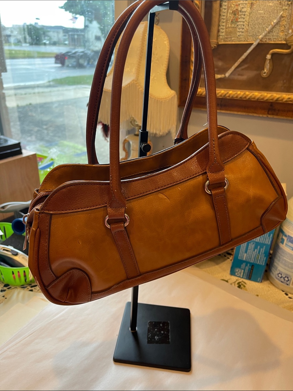 Rina Rich Brown and Tan Leather and vinyl Handbag Label View